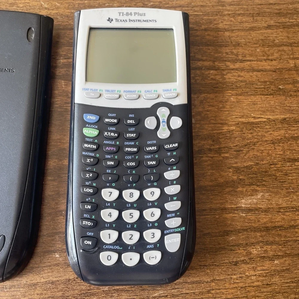 Texas Instruments TI-84 Plus Graphing Calculator with Slip Cover Tested